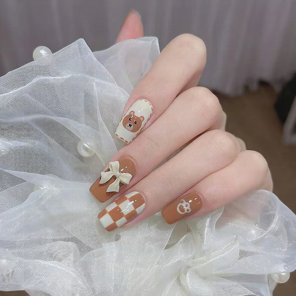 Uñas postizas artísticas con diseño de osito y lazos