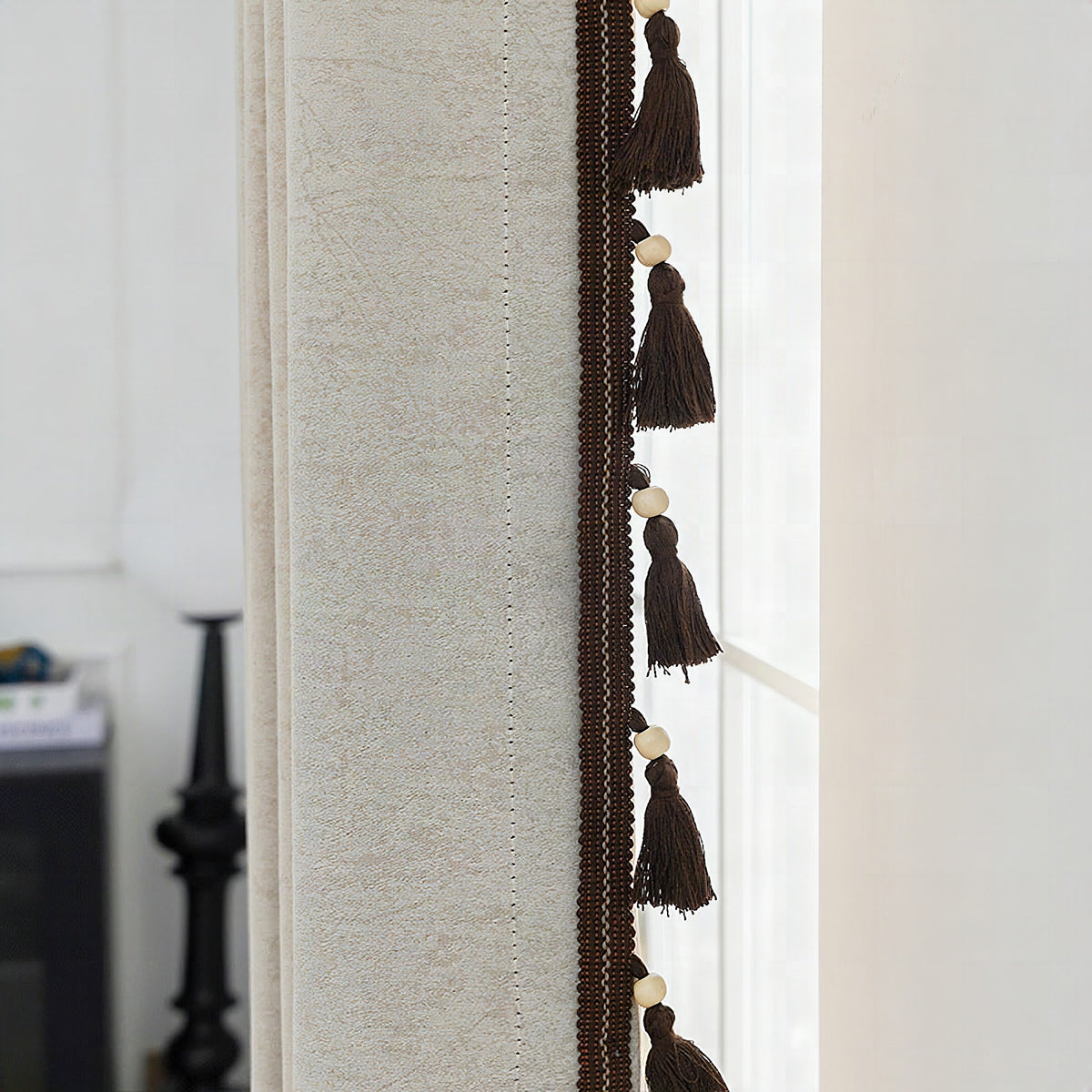 Cortina decorativa con flecos