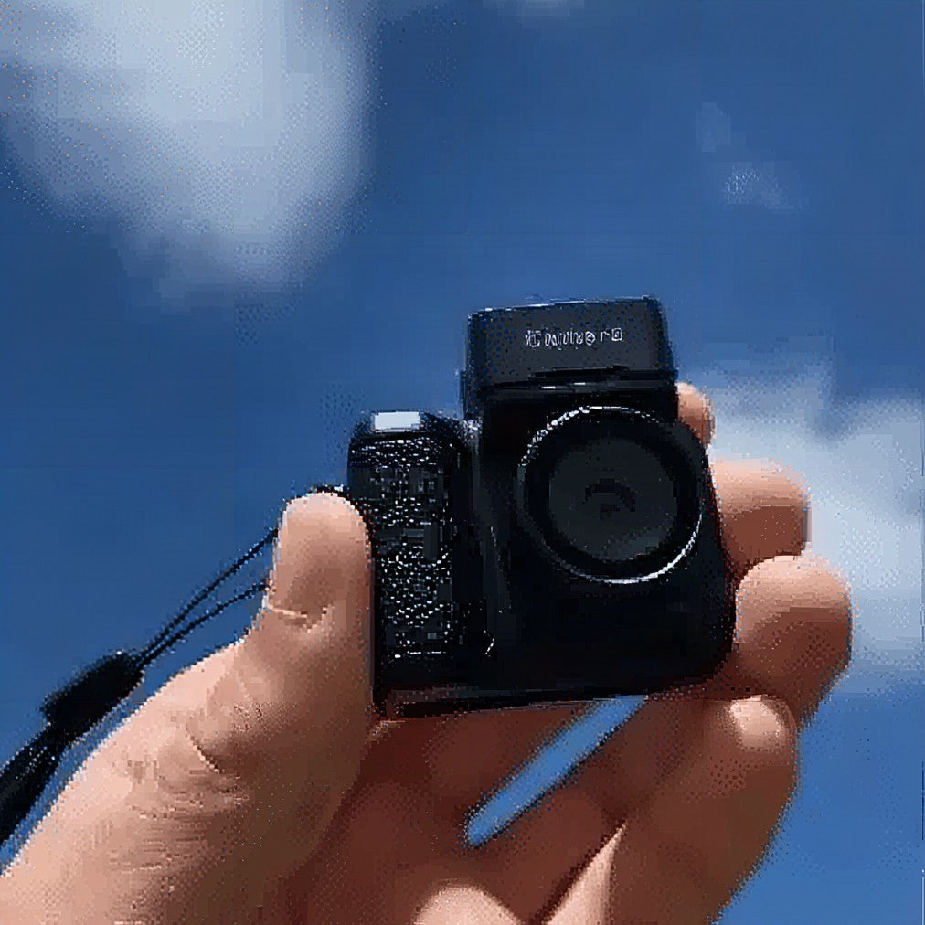 Mini cámara vintage para fotografía nostálgica