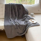 Manta impermeable CozyGuard – reversible, antimanchas y suave diseño de felpa