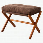 Taburete plegable con asiento acolchado y estructura de madera