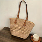 Bolso de mano con diseño trenzado y asas de piel
