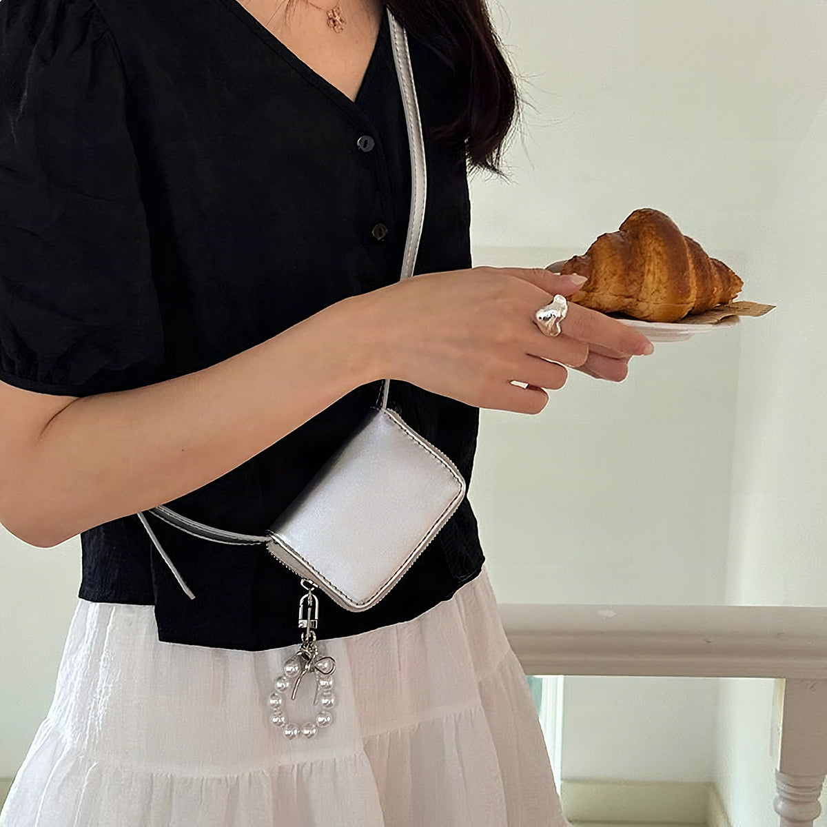 Mini bolso bandolera tipo clutch