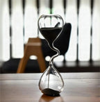 Reloj de arena curvo negro de cristal
