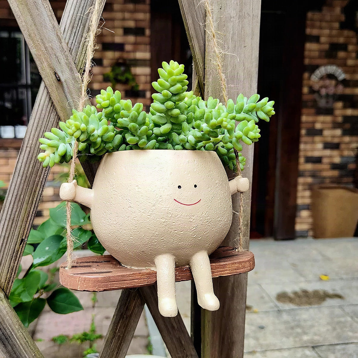 Maceta colgante Happy Buddy con diseño divertido