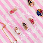 Joyero transparente con forma de caramelo (10 unidades)