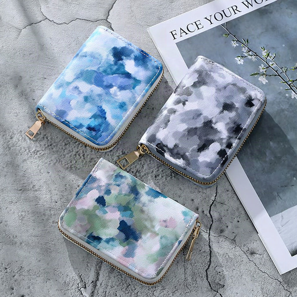 Cartera compacta con cremallera y estampado de camuflaje marmolado
