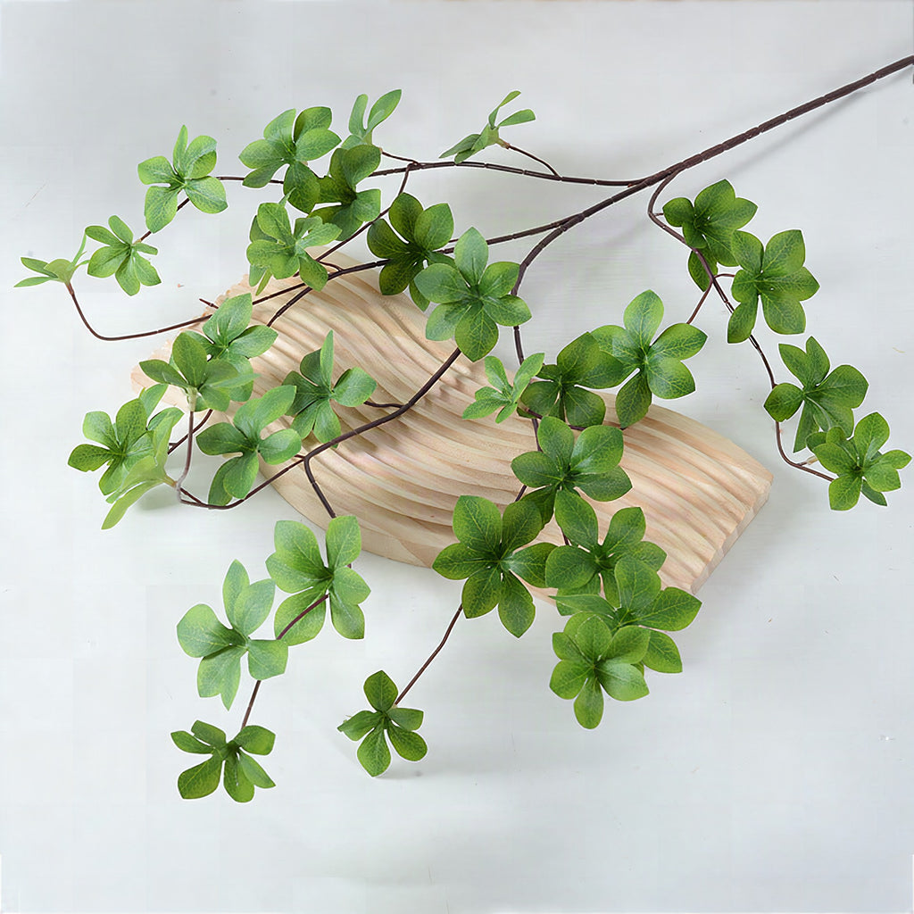 Planta verde decorativa artificial