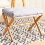 Taburete plegable con asiento acolchado y estructura de madera
