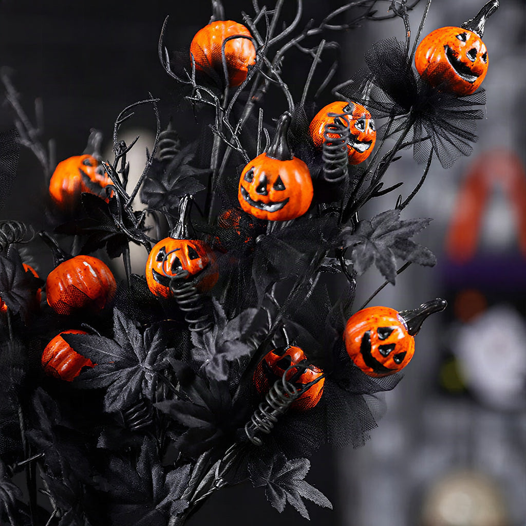 Rama decorativa de calabazas negras para Halloween