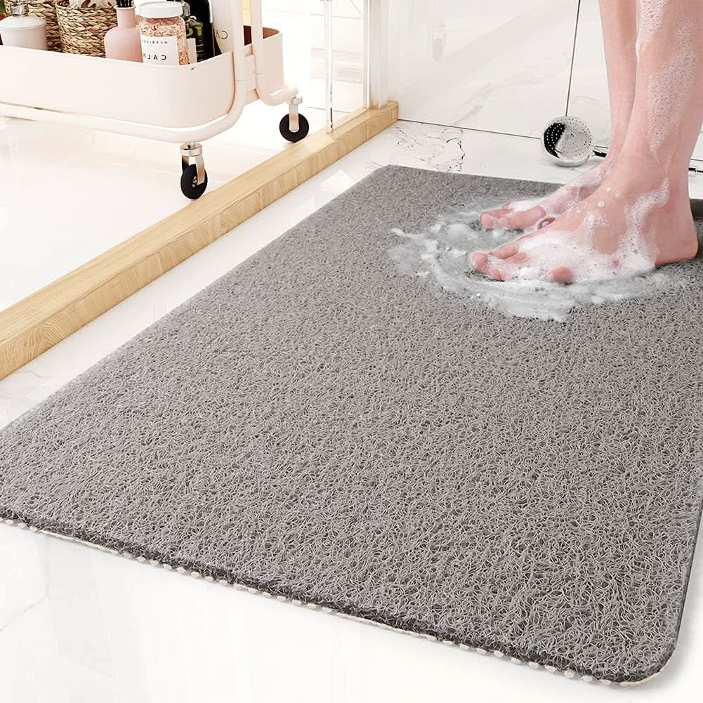 Alfombrilla antideslizante universal para ducha con sistema de drenaje higiénico