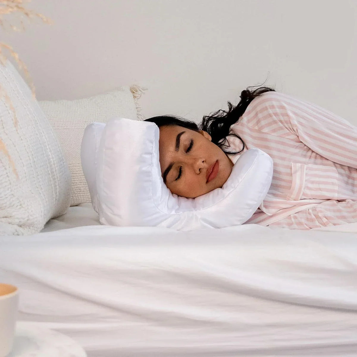 Almohada antiarrugas con funda de satén para un sueño reparador