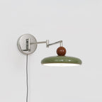 Aplique de pared Lola con disco redondo y LED integrado para interior