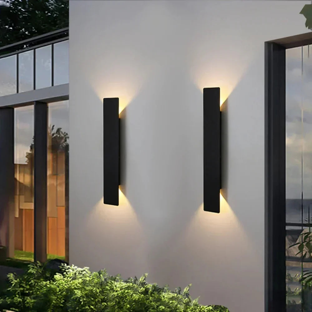 Aplique de pared exterior de aluminio impermeable con iluminación LED bidireccional