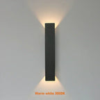 Aplique de pared exterior de aluminio impermeable con iluminación LED bidireccional