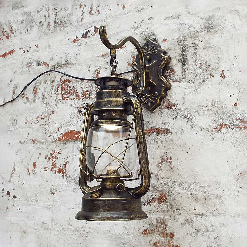 Aplique de pared estilo farol con cristal transparente, 1 luz, acabado negro o latón envejecido