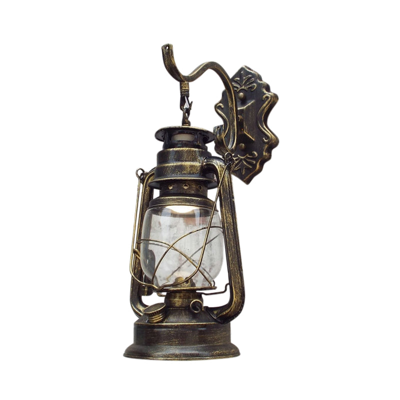 Aplique de pared estilo farol con cristal transparente, 1 luz, acabado negro o latón envejecido