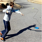 Base de entrenamiento de tenis con pelota y cuerda elástica