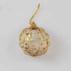 Bola de Navidad escamada con polvo dorado