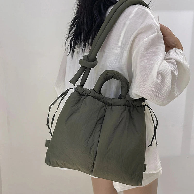 Bolso acolchado Riva con bandolera ajustable