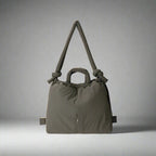 Bolso acolchado Riva con bandolera ajustable