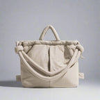 Bolso acolchado Riva con bandolera ajustable