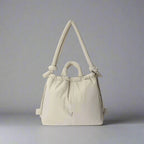 Bolso acolchado Riva con bandolera ajustable