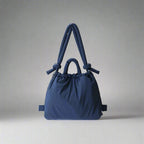 Bolso acolchado Riva con bandolera ajustable