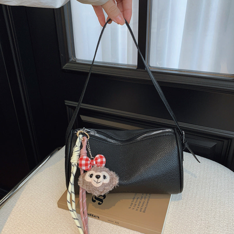 Bolso clutch bandolera con textura elegante