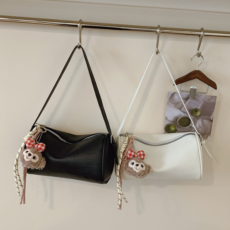 Bolso clutch bandolera con textura elegante