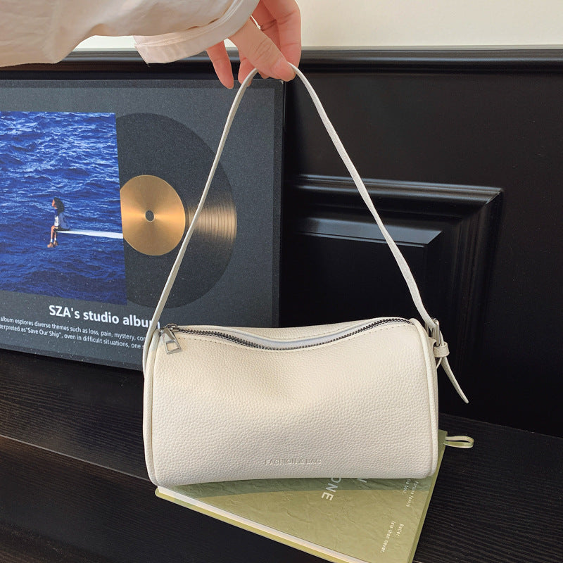 Bolso clutch bandolera con textura elegante