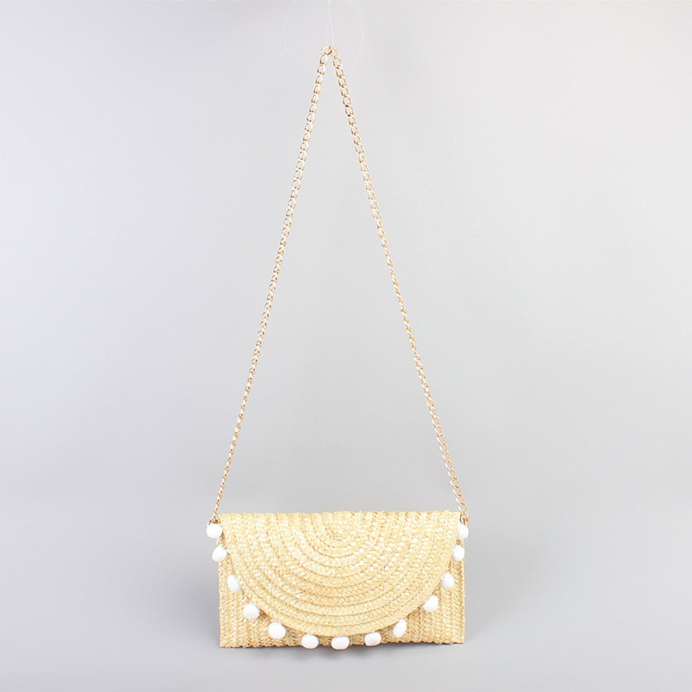 Bolso clutch de paja