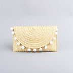 Bolso clutch de paja