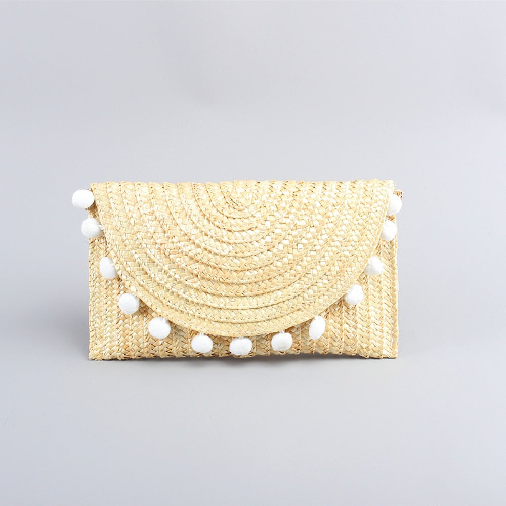 Bolso clutch de paja