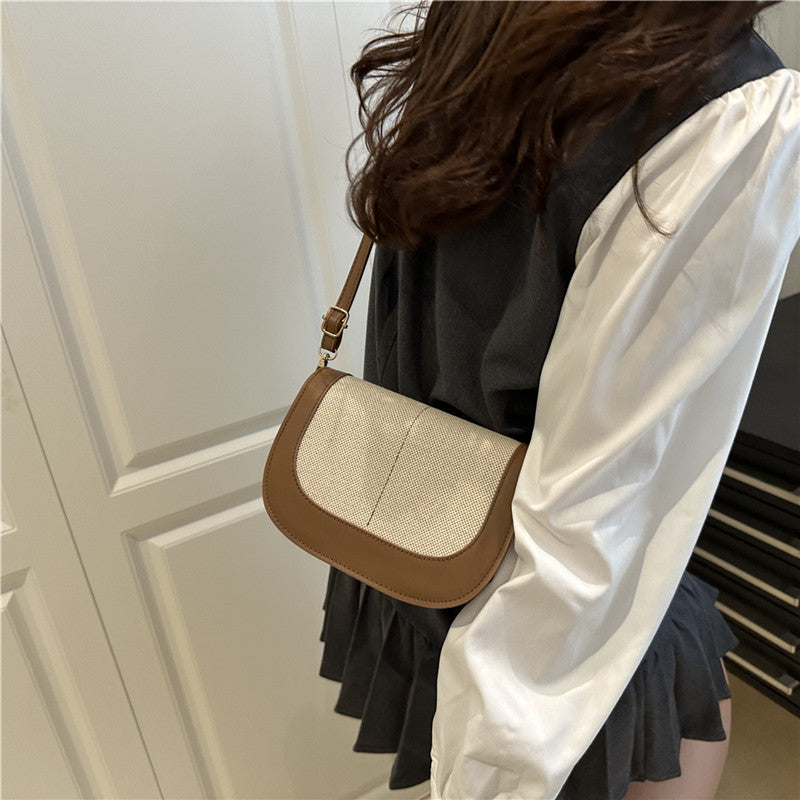 Bolso clutch estructurado con bandolera