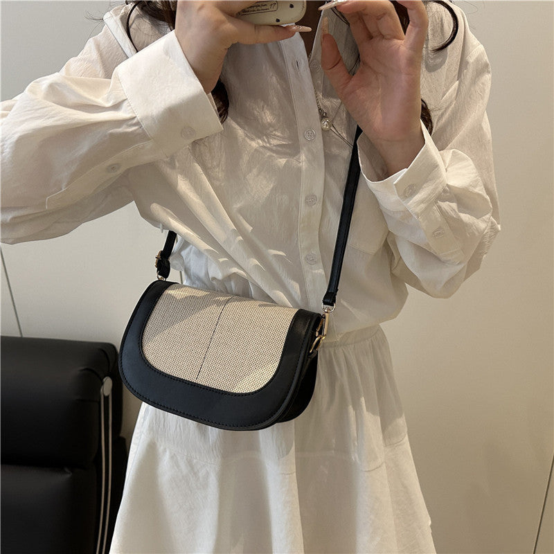 Bolso clutch estructurado con bandolera