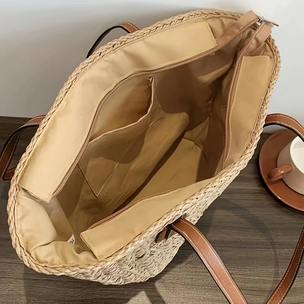 Bolso de mano con diseño trenzado y asas de piel