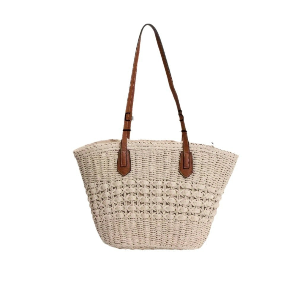 Bolso de mano con diseño trenzado y asas de piel