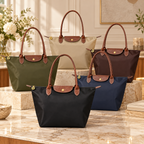 Bolso de mujer con detalles lujosos y asas prácticas