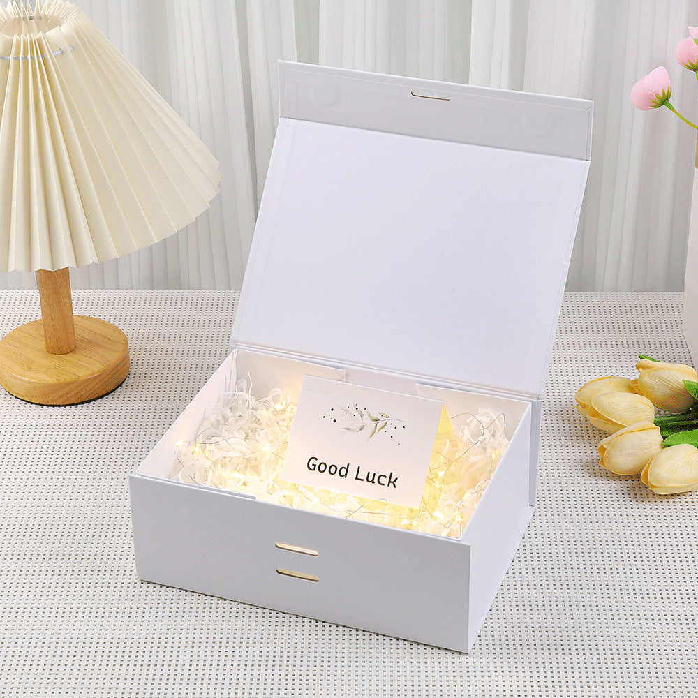 Caja de regalo magnética premium con luces LED y tarjeta de felicitación
