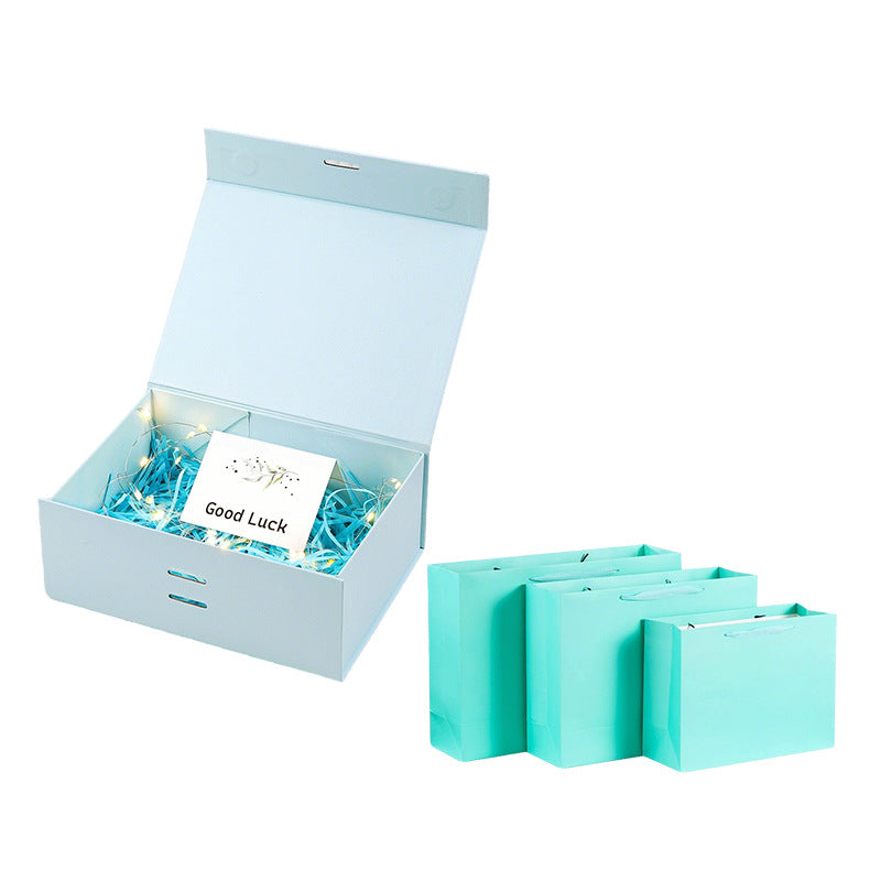 Caja de regalo magnética premium con luces LED y tarjeta de felicitación