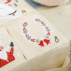 Calendario de adviento con 24 bolsitas de tela para niños – Decoración navideña colgante multicolor