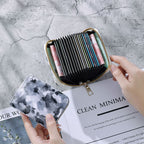 Cartera compacta con cremallera y estampado de camuflaje marmolado