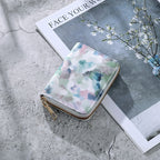 Cartera compacta con cremallera y estampado de camuflaje marmolado
