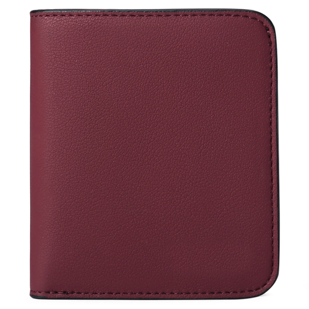Cartera compacta con cremallera para tarjetas y monedas acabado saffiano