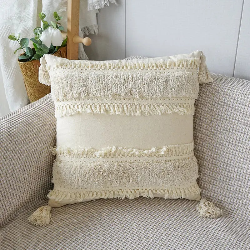 Cojín decorativo con textura y flecos