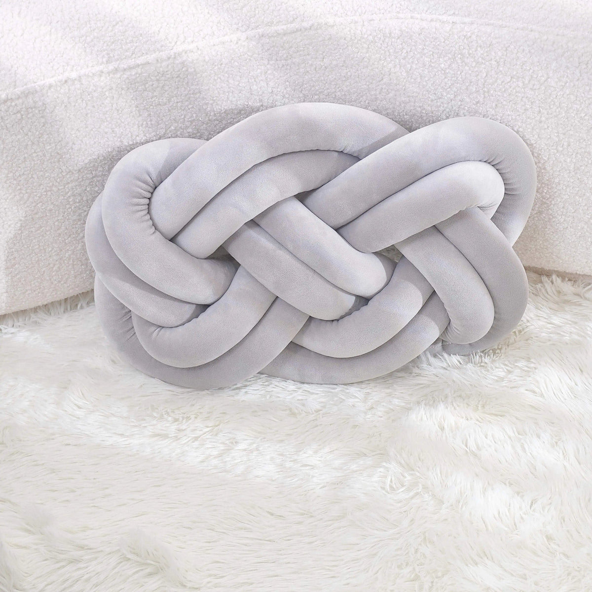 Cojín decorativo con diseño geométrico anudado | Poliéster lavable | 40×30 cm