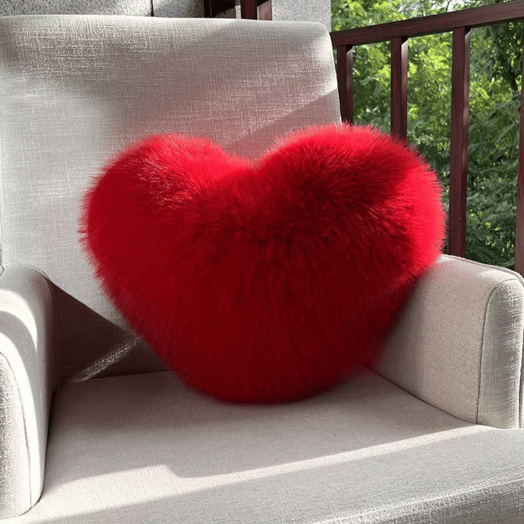 Cojín decorativo suave con forma de corazón y textura de peluche