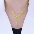 Collar con mariposa calada dorada y borlas