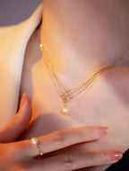 Collar de perlas de agua dulce con baño de oro 24k